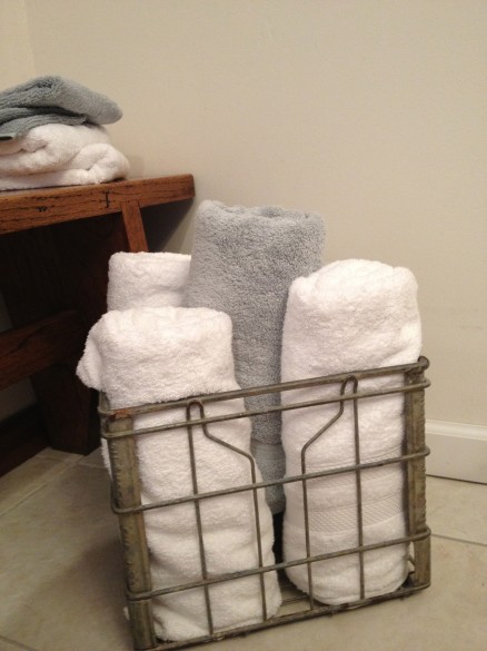 My towels in my Biltmore Dairy milk crate. Bench is from the dining room